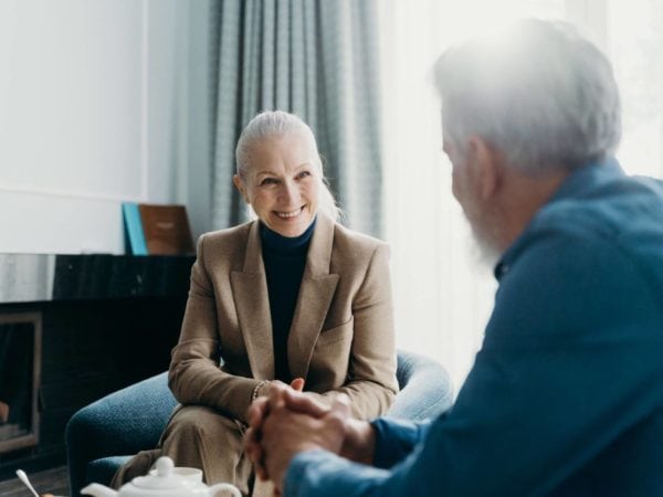 older people smiling at eachother